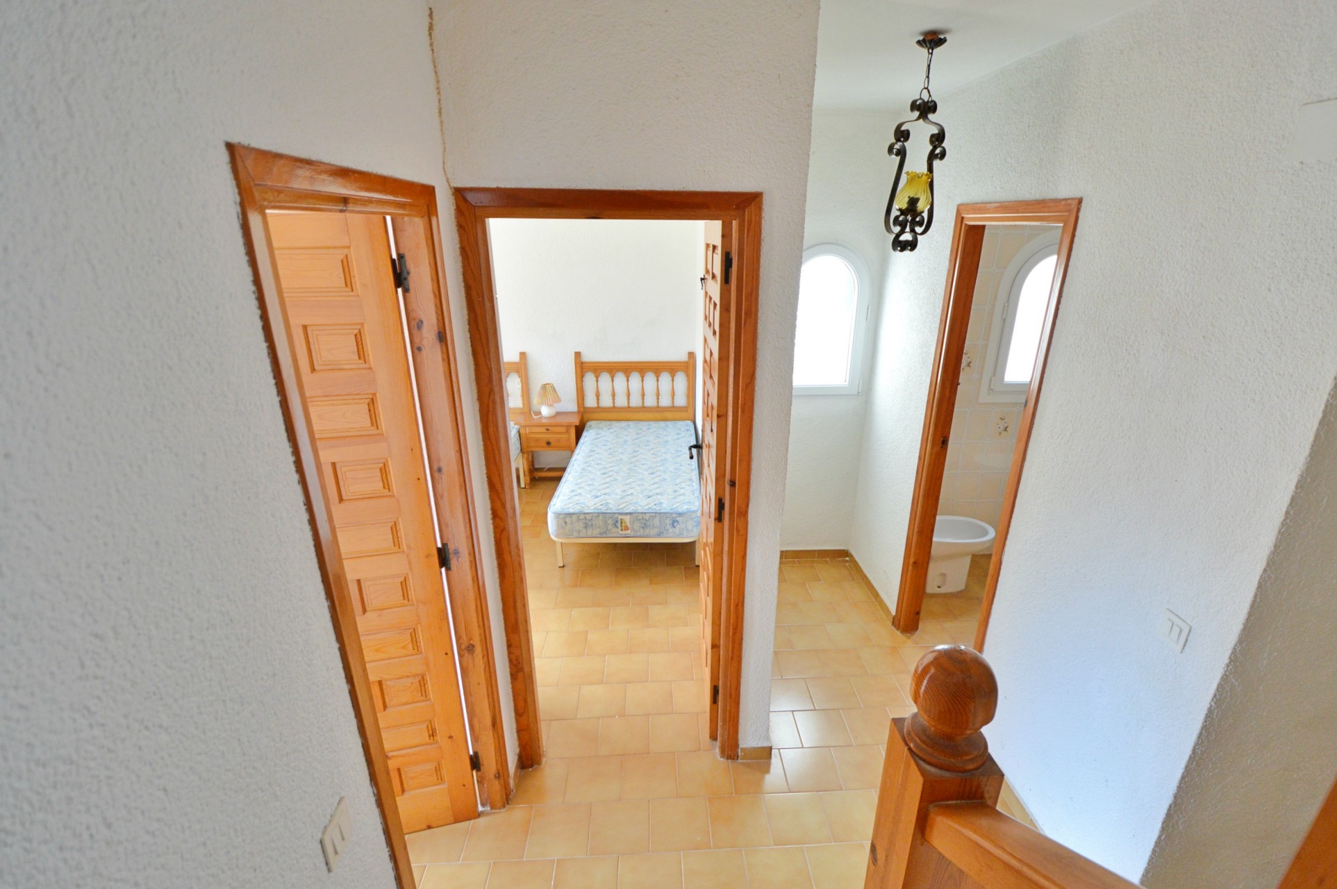 Casa adosada de tres dormitorios en venta cerca de la playa de Cala Blanca